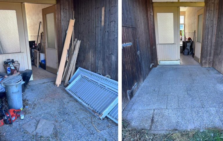 Hausdurchgang mit Werkzeugen und Holz auf der linken Seite, öffentlicher Raum auf der rechten Seite.